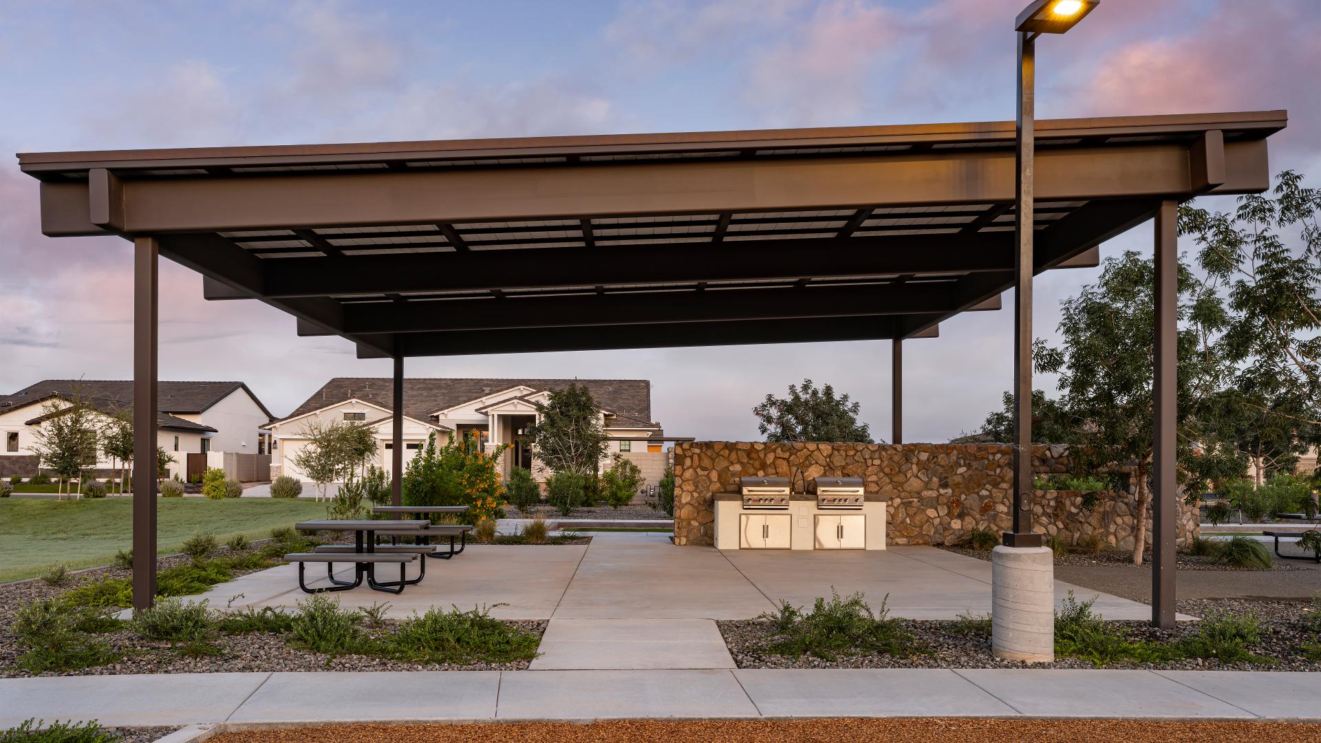 Outdoor community kitchen with covered seating