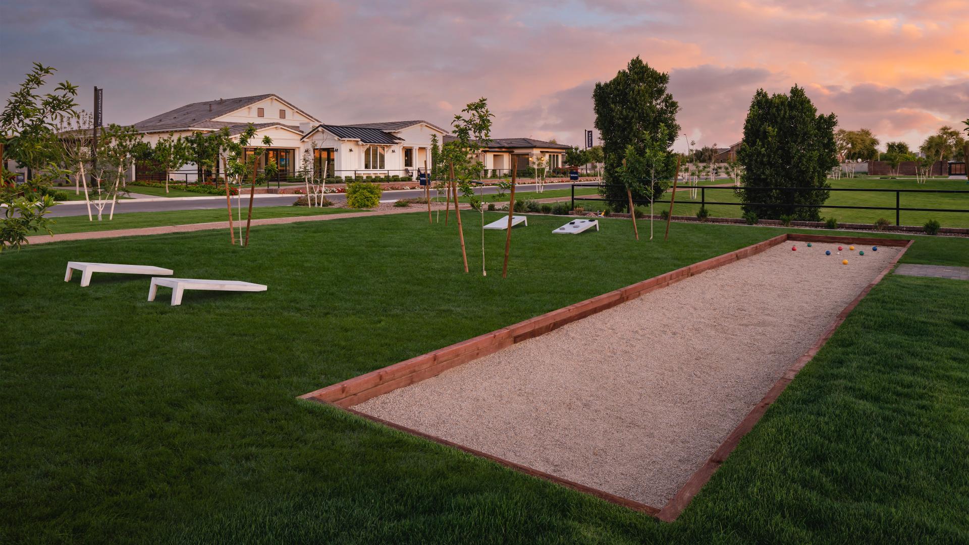 Community bocce ball court and corn hole