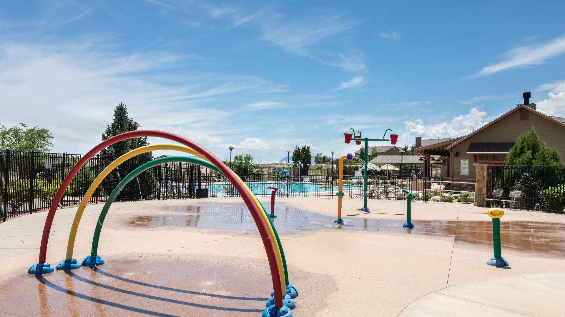 Spend summer days with family at the community pool and splash zone